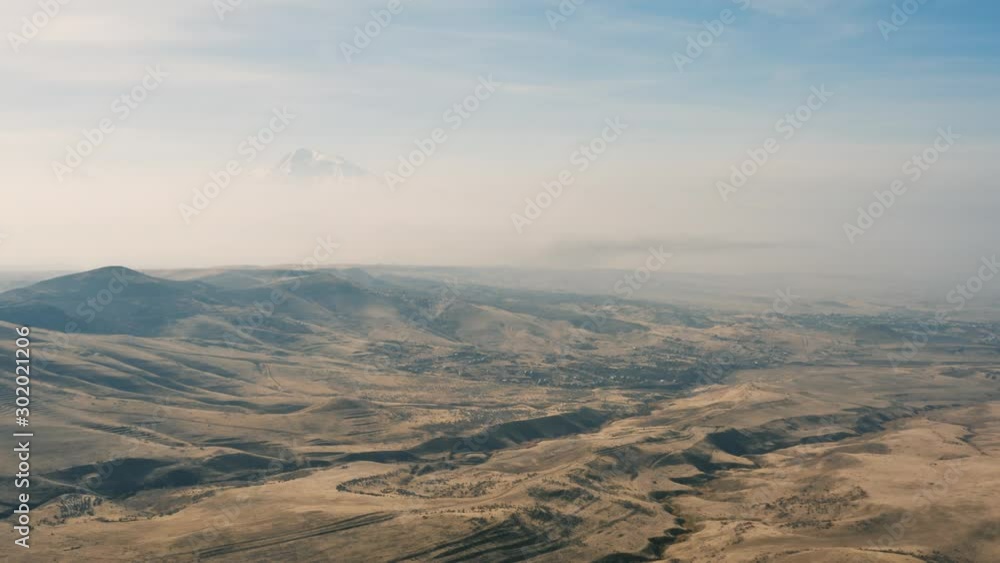 Landscape of Armenia, aerial view. Peak of Ararat mount on background Landscape of Armenia, aerial view. Peak of Ararat mount on background