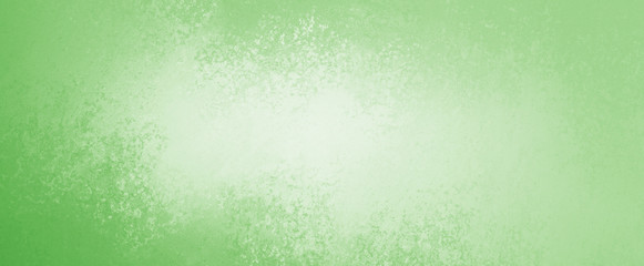Pastel green  background with abstract texture grunge color splash on borders with white center design in pastel colors, blank spring or Easter color with copyspace for adding text or website banner d