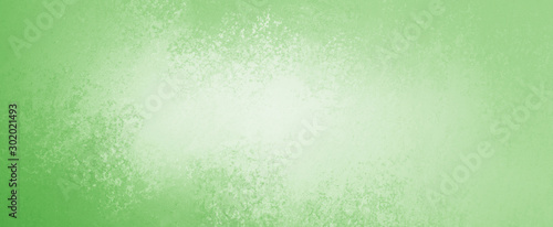 Pastel green  background with abstract texture grunge color splash on borders with white center design in pastel colors, blank spring or Easter color with copyspace for adding text or website banner d