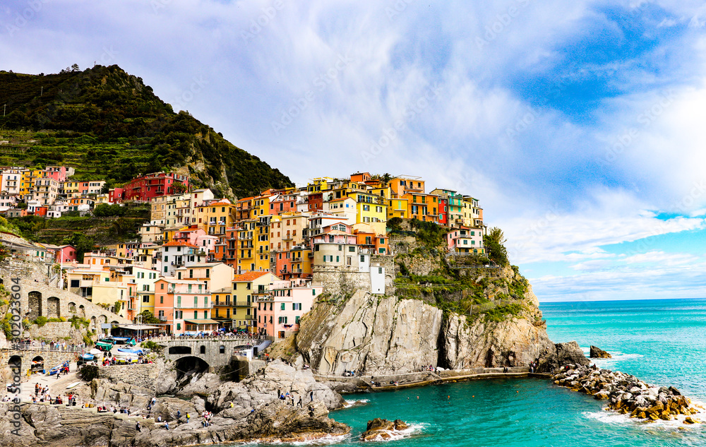 Exploring the coastal village of Manarola, which is a small village in the Liguria region of Italy known as Cinque Terra