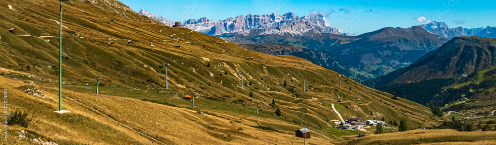 Beautiful alpine view with a well-known world war one memorial at the famous Passo Pordoi, South Tyrol, Italy