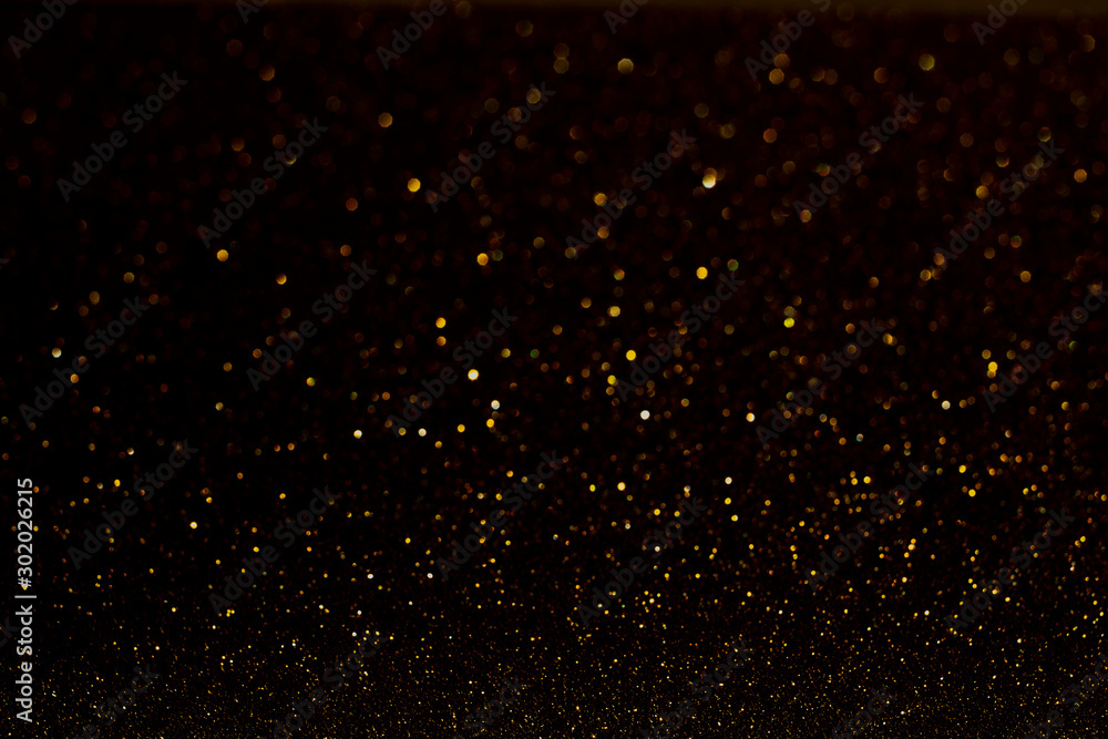  Christmas Background. Happy New Year.Christmas golden light shine particles bokeh on black background, holiday. Concept