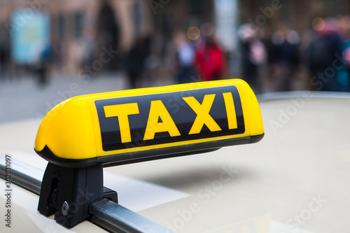 Close-up of a Taxi Sign