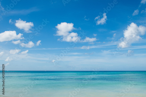 Caribbean landscape  azure sea  deep blue sky and white small clouds