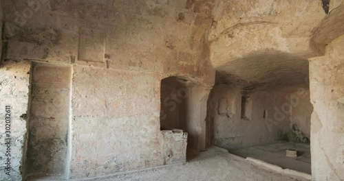 Sassi of Matera with arched ceilings and vaults. Ancient underground house dug out of the tufa rock.