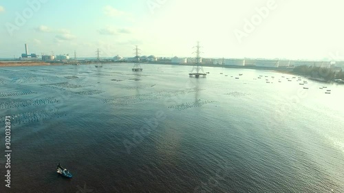 aerial view of industry estae beside sea coast photo