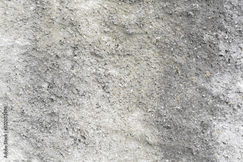 close up of rough gray concrete wall background 
