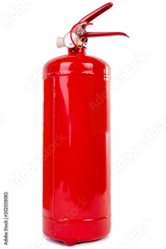 red fire extinguisher isolated on white background © Sergei Zub