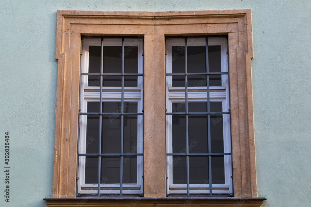 Antique multi-colored barred window