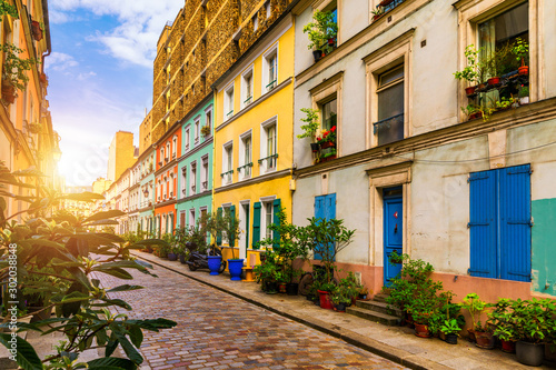 Cremieux Street (Rue Cremieux), Paris, France. Rue Cremieux in the 12th Arrondissement is one of the prettiest residential streets in Paris. Colored houses in Rue Cremieux street in Paris. France. © daliu