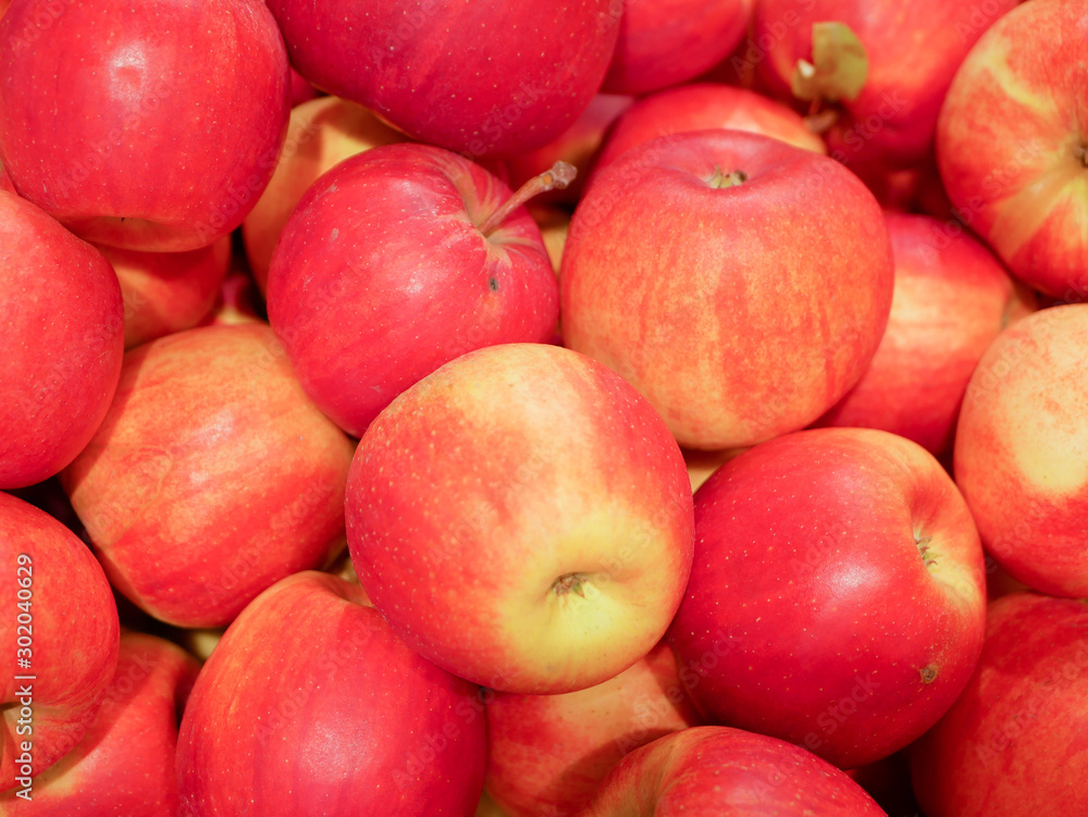 apples from the store. buyers choose and buy apples at the supermarket stand. close-up. Fresh beautiful red big apples in the store in boxes. apples from the store. buyers choose and buy apples at the supermarket stand. close-up. Fresh beautiful red big apples in the store in boxes.