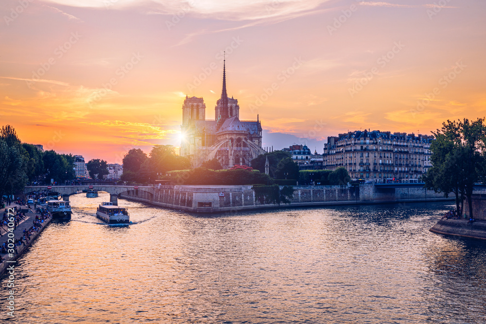 Notre Dame de Paris cathedral, France. Notre Dame de Paris Cathedral, most beautiful Cathedral in Paris. Picturesque sunset over Cathedral of Notre Dame de Paris, destroyed in a fire in 2019, Paris.