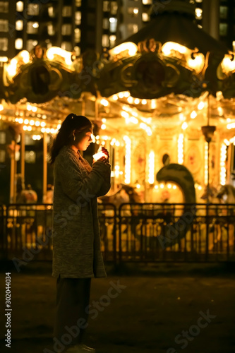 Photography Asian girl holding candle at the playground