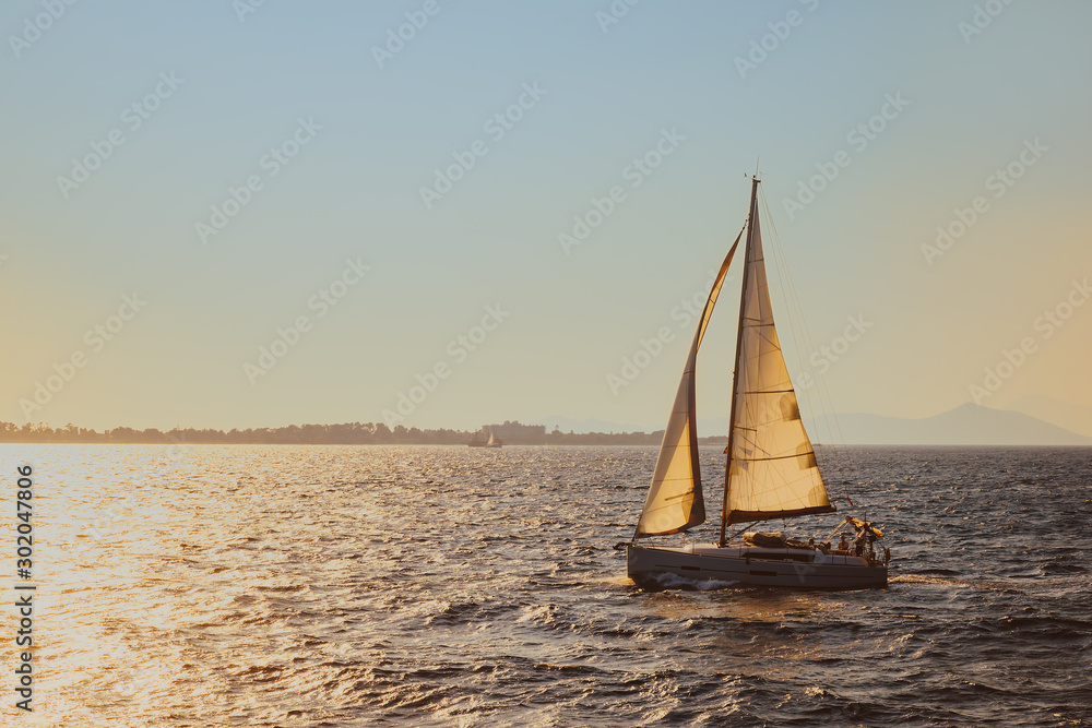 Yacht in the sea at sunset in Mediterranean sea, Turkey