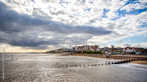 Southwold seafront and lighthouse with dramtaic sky in Southwold, Suffolk, UK © Nigel