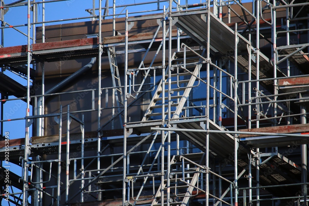 Close-up of a scaffolding on a corner of an apartment building