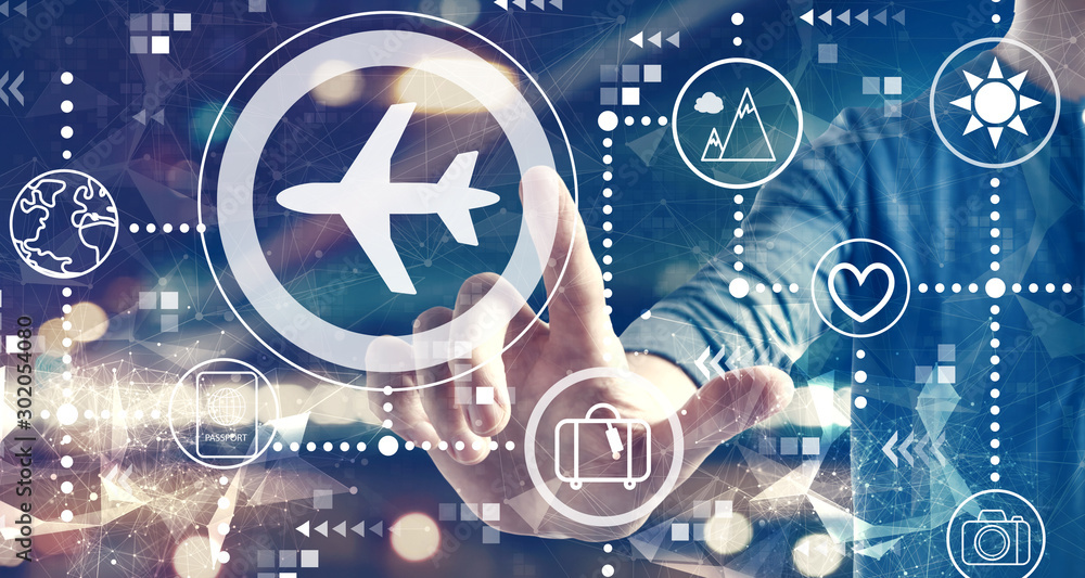 Fototapeta premium Airplane travel theme with a man on blurred city background