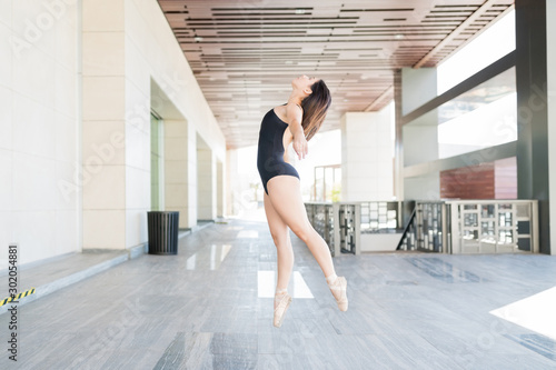 Ballerina balancing while dancing on tiptoe