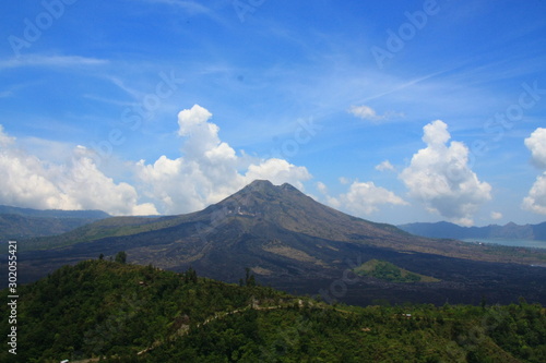 Clouds and blue sky around the volcano