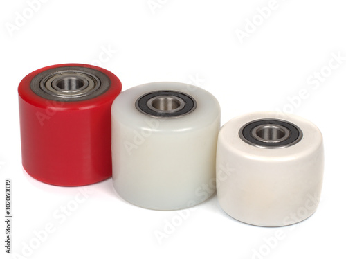 An industrial rollers for hoisting equipment made of polyamide and polyurethane isolated on a white