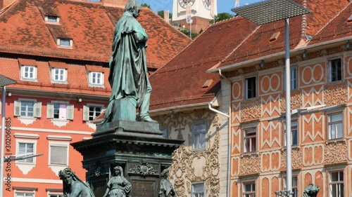 The clock tower (Uhrturm), as seen from town hall, Graz, Austria photo