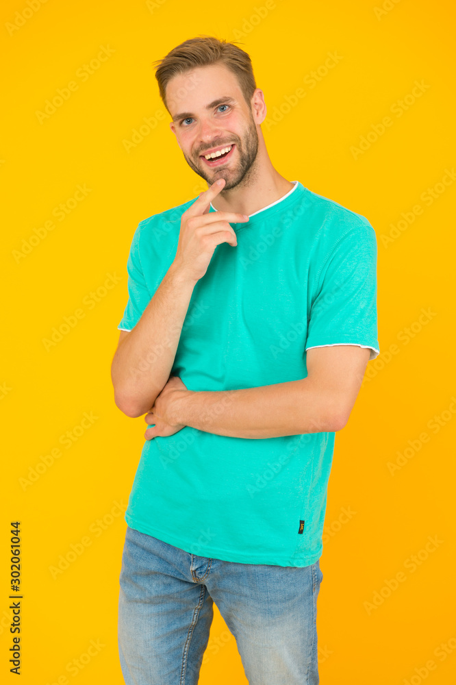 improve your mood. happy feeling today. handsome guy in good mood. male  facial care. having perfect look. sexy man beard yellow background.  unshaven man express positivity. he has stylish bristle foto de