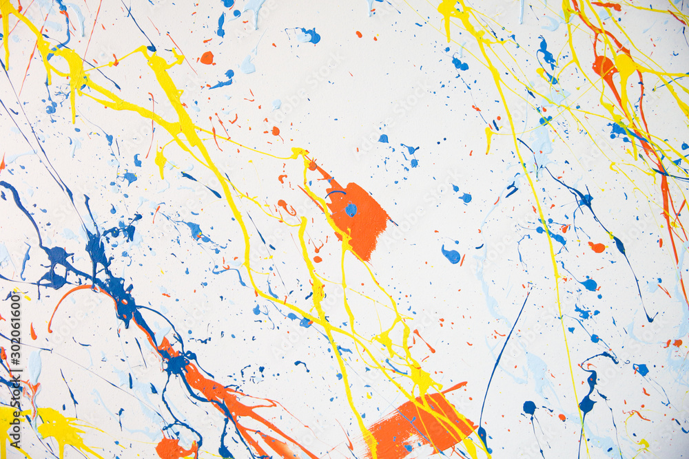 texture of multi-colored paint splashes on white background texture of multi-colored paint splashes on white background