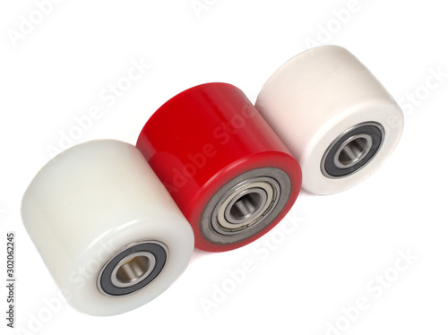 An industrial rollers for hoisting equipment made of polyamide and polyurethane isolated on a white