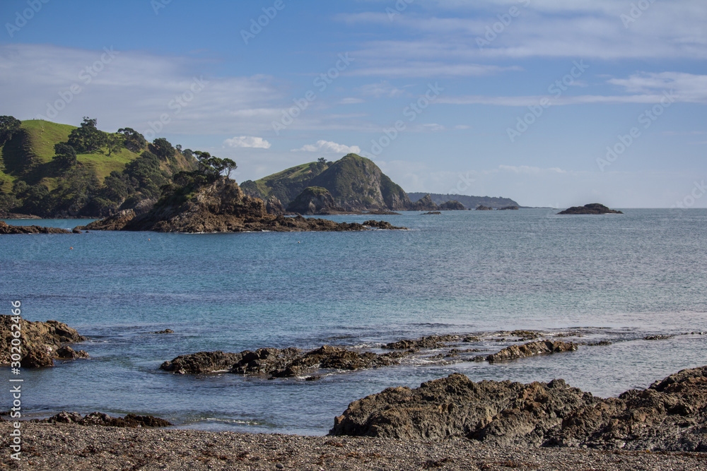 View out to the Ocean from Putataua Bay Beach, near Matauri Bay in Northland New Zealand on Bright Sunny Day