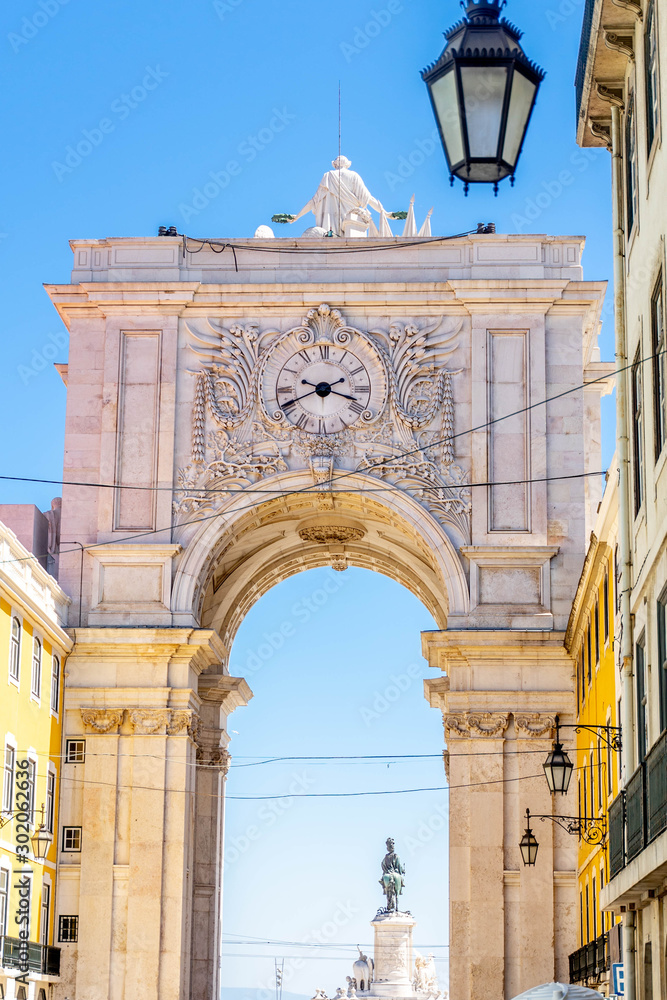 27.08.2019 - Portugal, Lisbon. famous triumphal arch Rua Augusta Arch on Commerce Square in Lisboa. busy touristic european capital city center. vertical shot.