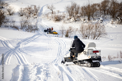 Rider on the snowmobile in nature of Siberia, Russia © dtatiana