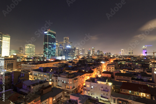 Skyline panorama of city Tel Aviv with urban skyscrapers at night, Israel