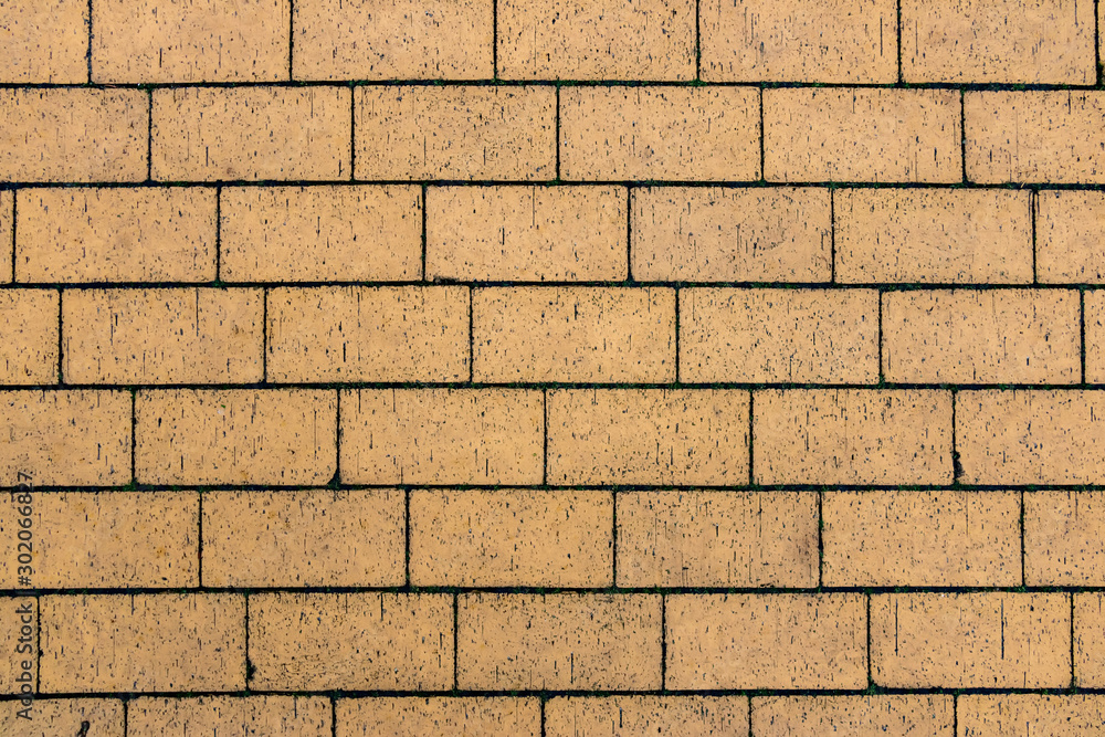 Fototapeta premium yellow rectangular brick wall background