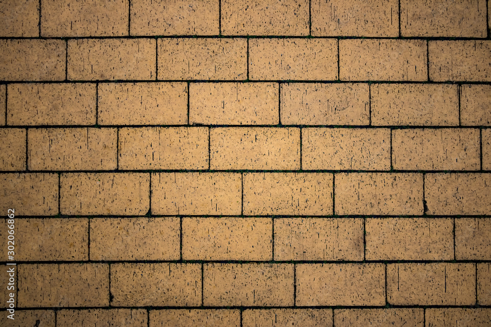 Fototapeta premium yellow rectangular brick wall background