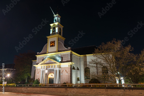 Dutch protestant church is illuminated at night