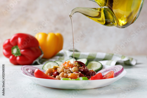 Quinoa salad with vegetables and olive oil. Vegan food.