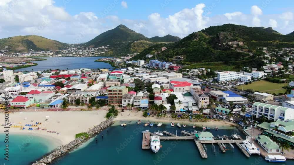Aerial view of the Philipsburg harbor on Saint Martin island. Some hotels, beach and sailing yachts. Beautiful beach and sailing yachts piers. Aerial view of the Philipsburg harbor on Saint Martin island. Some hotels, beach and sailing yachts. Beautiful beach and sailing yachts piers.