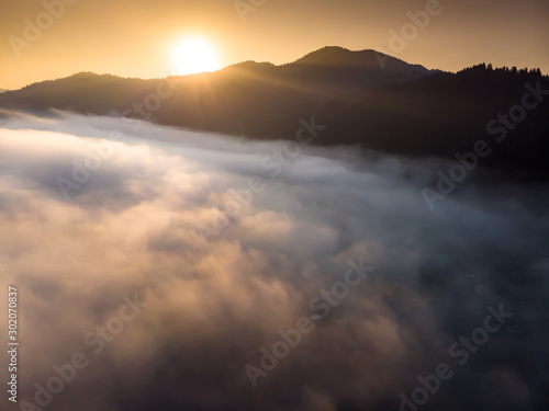 sunrise and fog in the mountains