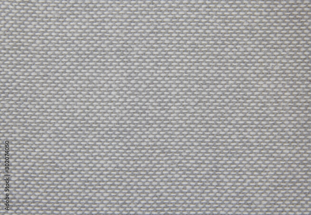 Fabric texture close-up. Grey cloth. Natural fabric. Fabric texture close-up. Grey cloth. Natural fabric.