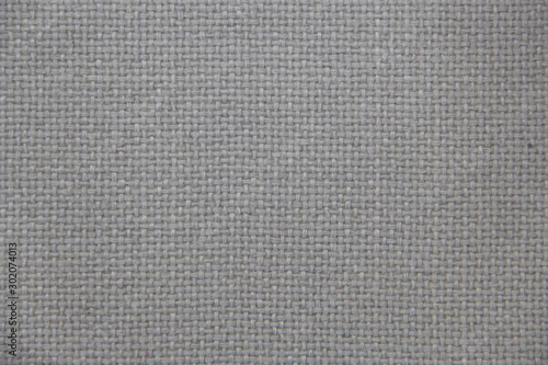 Fabric texture close-up. Grey cloth. Natural fabric.