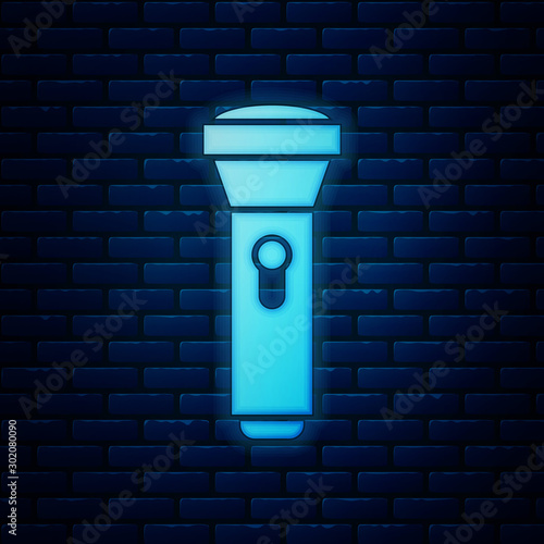 Glowing neon Flashlight icon isolated on brick wall background. Vector Illustration