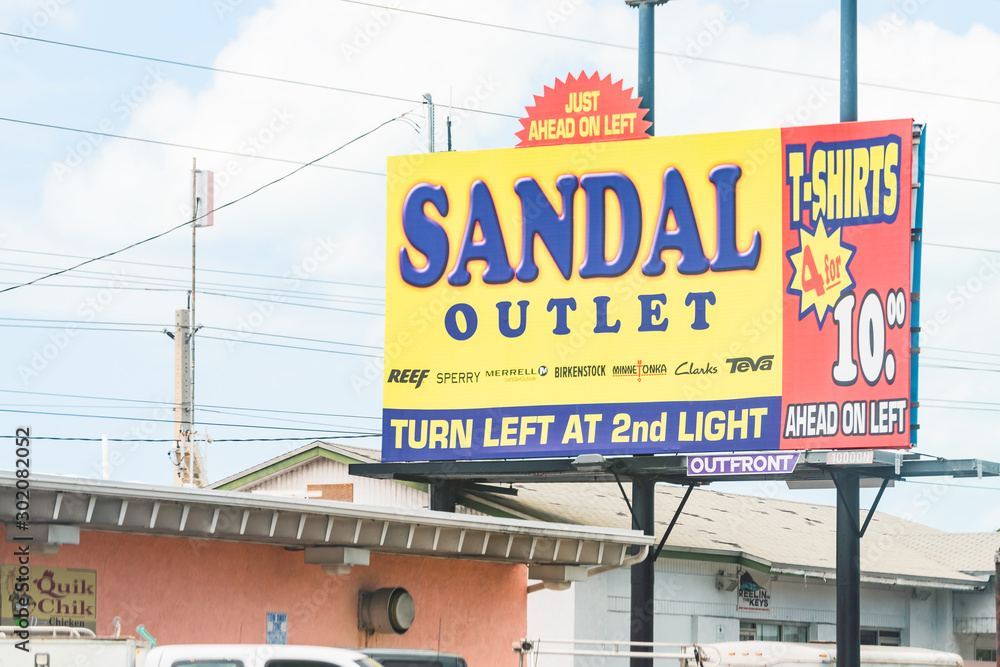 Key West USA - May 1, 2018: Sandal Factory outlet store, shop sign,  advertisement, advertising billboard, direction information in Florida Keys  Stock Photo | Adobe Stock