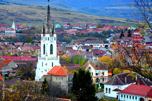 Typical rural landscape and peasant houses in Garbova, Transylvania, Romania. The settlement was founded by the Saxon colonists in the middle of the 12th century photo