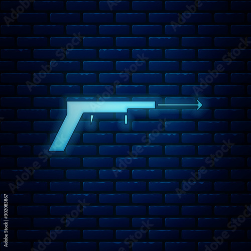 Glowing neon Fishing harpoon icon isolated on brick wall background. Fishery manufacturers for catching fish under water. Diving underwater equipment. Vector Illustration