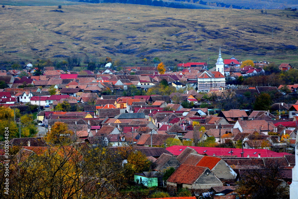 Typical rural landscape and peasant houses in Garbova, Transylvania, Romania. The settlement was founded by the Saxon colonists in the middle of the 12th century