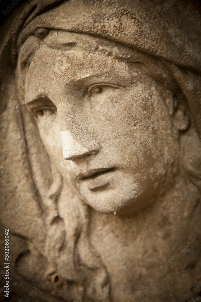 The look of love and eyes of Virgin Mary. Fragment of beautiful ancient statue. Religion, faith, Christianity concept. The look of love and eyes of Virgin Mary. Fragment of beautiful ancient statue. Religion, faith, Christianity concept.