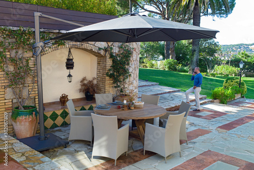 dining table with chairs in the garden 