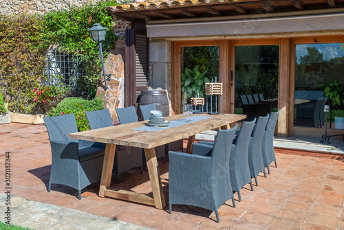 dining table with chairs in the garden