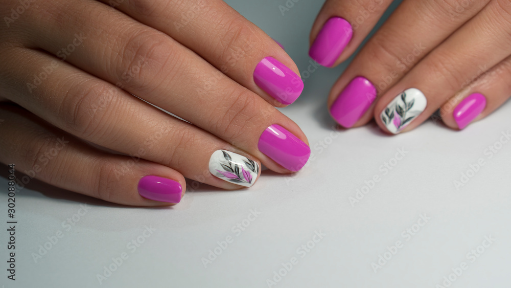 Nails Art Design. Hands With Manicure. Close Up Of Female Hands With Trendy Nails with decorations. Nails Art Design. Hands With Manicure. Close Up Of Female Hands With Trendy Nails with decorations.