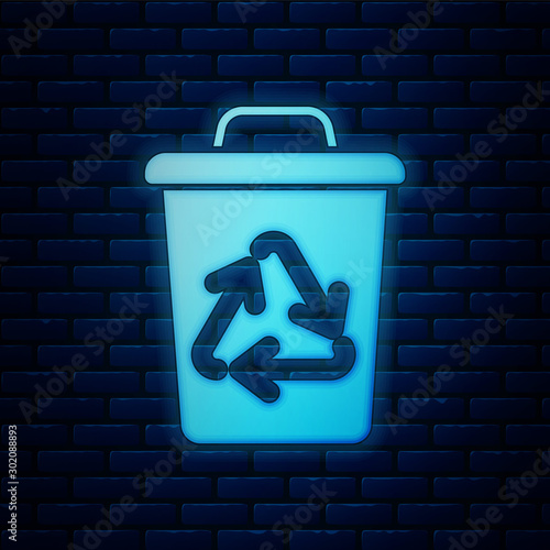 Glowing neon Recycle bin with recycle symbol icon isolated on brick wall background. Trash can icon. Garbage bin sign. Recycle basket sign. Vector Illustration